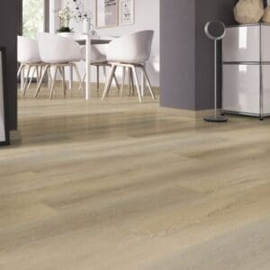 Dining area with white chairs and Sawcut Oak Natural vinyl flooring