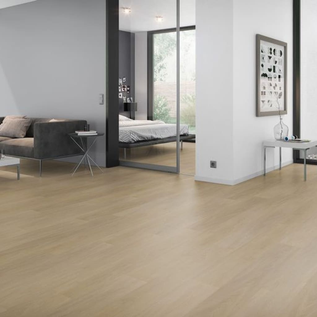 Spacious contemporary living area with English Oak Natural vinyl plank flooring.