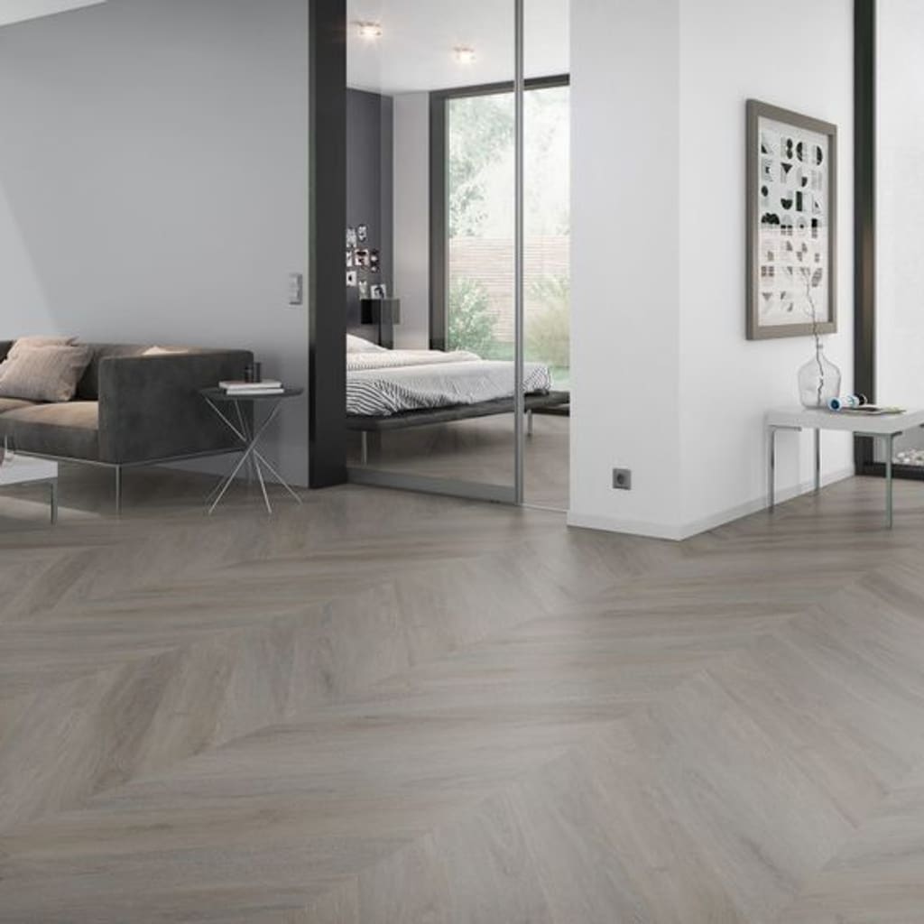 Modern living room featuring English Oak Taupe Chevron flooring with contemporary furniture