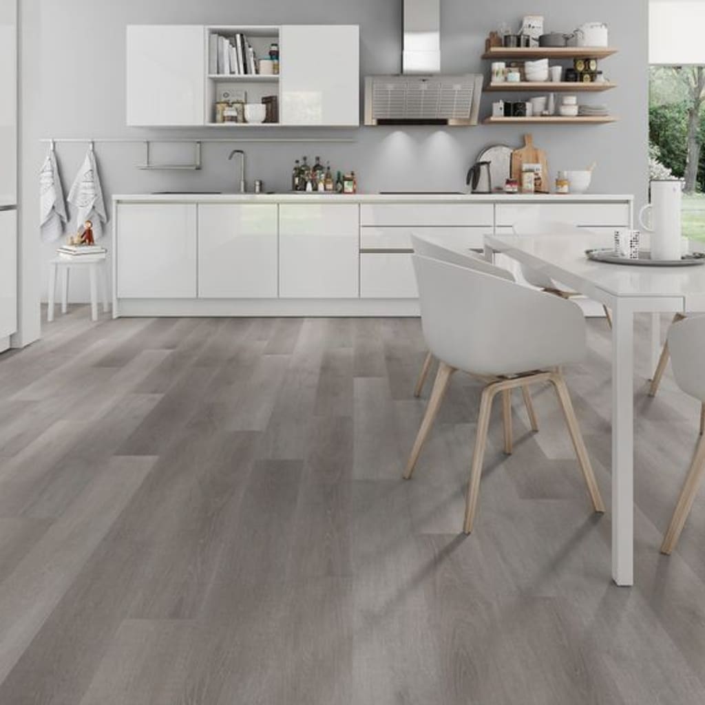 Contemporary white kitchen and dining area with Flemish Oak Grey wood effect flooring.