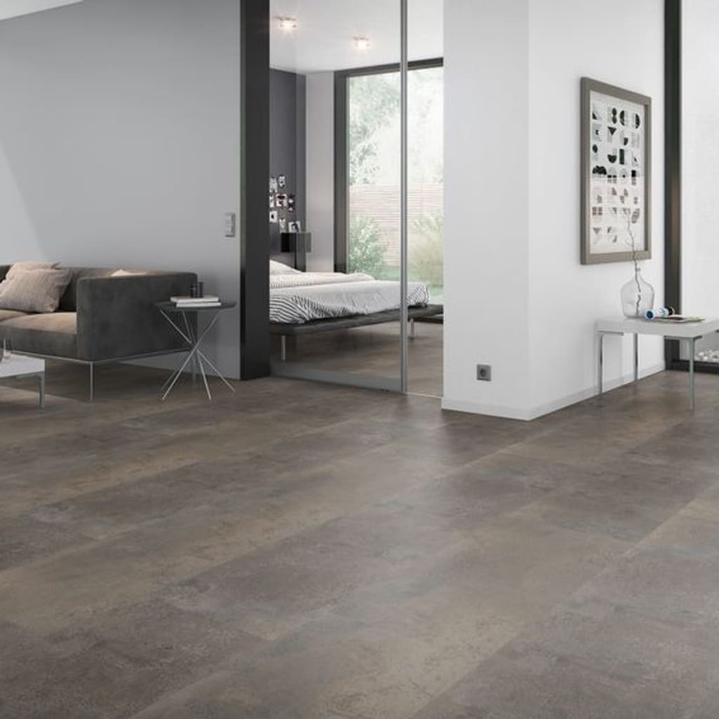 Modern living room interior featuring Oxyde Brown stone effect flooring with contemporary furniture