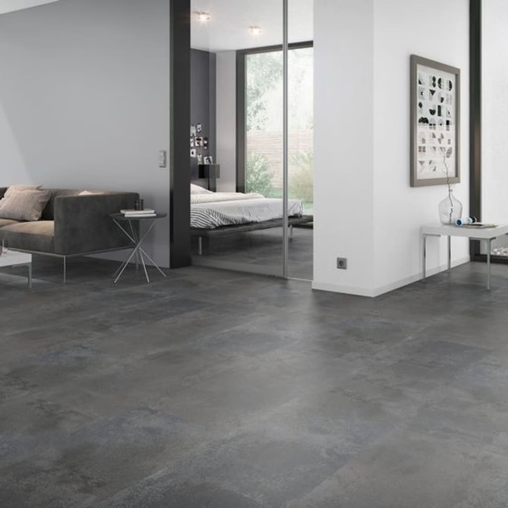 Spacious living area with dark grey stone effect vinyl tile flooring