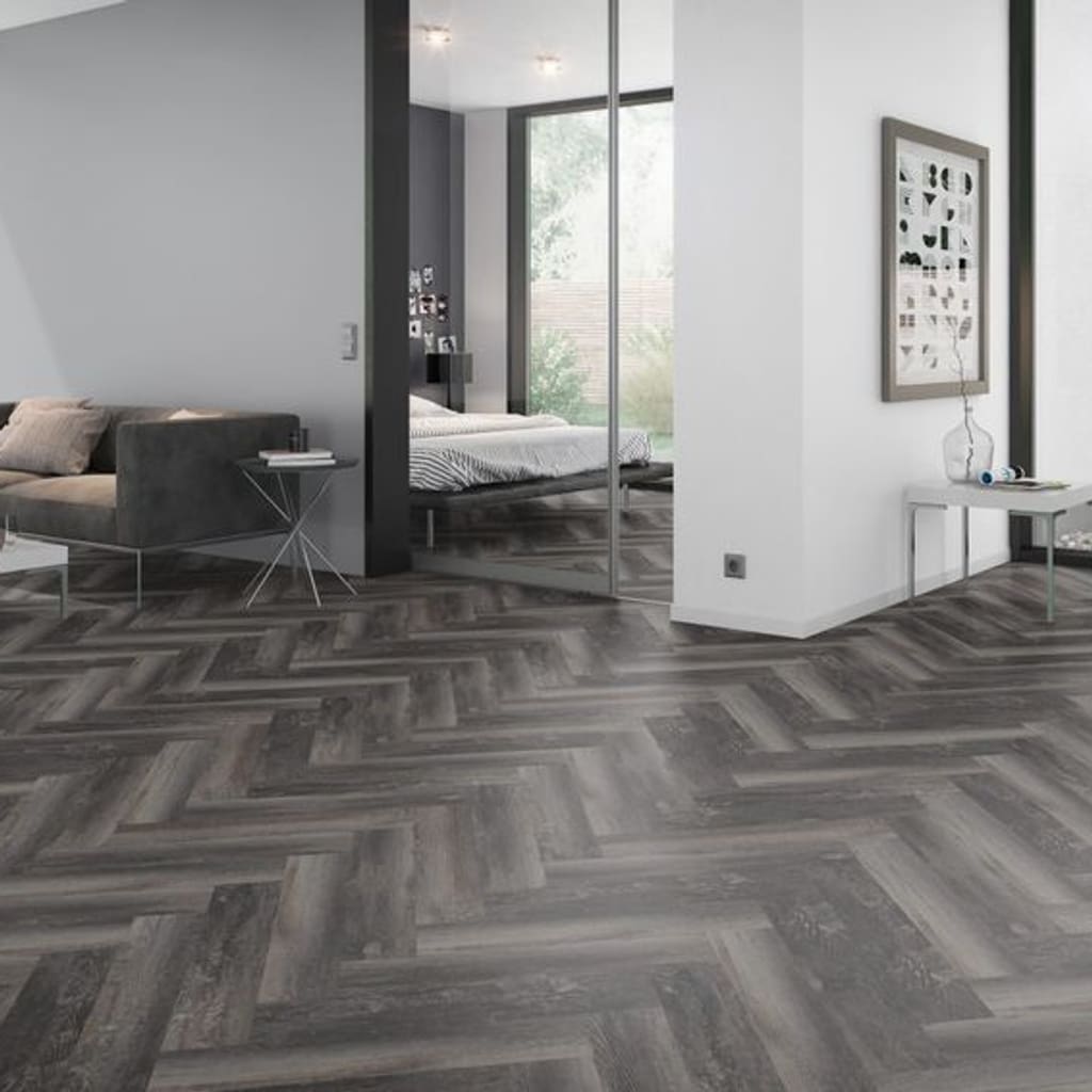 Modern living room interior featuring Smoked Pine Black Herringbone flooring