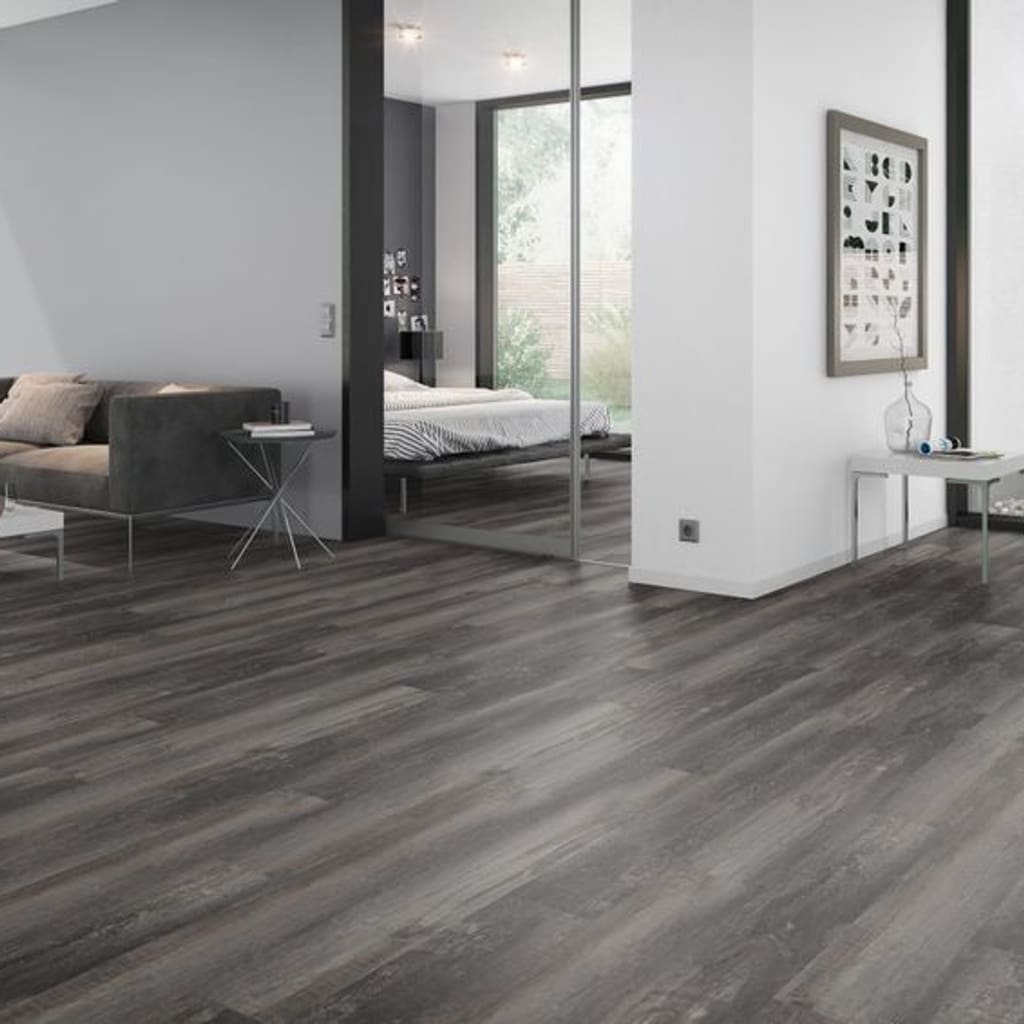 Spacious contemporary living area with dark wood effect vinyl plank flooring