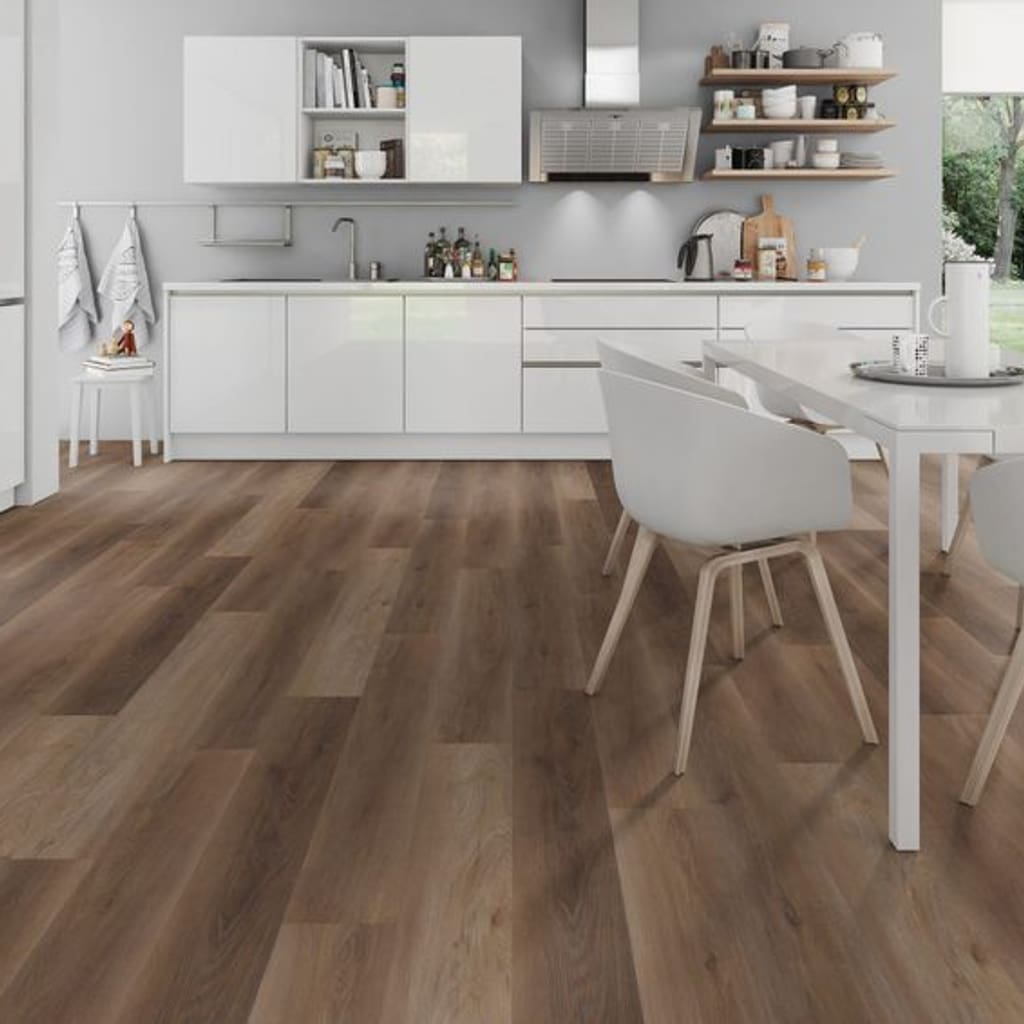 Bright modern kitchen and dining space with Walnut Natural luxury vinyl flooring