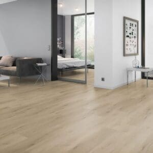 Spacious contemporary living area with light oak effect vinyl flooring