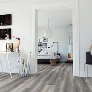 Modern bedroom interior featuring Pure Oak Grey wood effect flooring