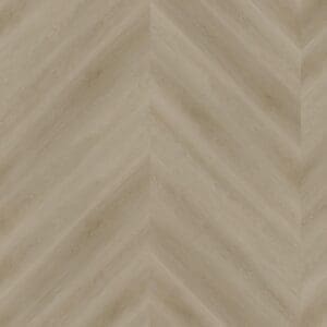 Close up of raw oak light natural chevron luxury vinyl flooring showing the geometric pattern