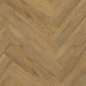 Close up of Royal Oak Natural herringbone luxury vinyl flooring showing wood grain detail.