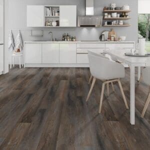 Smoked Pine Brown vinyl flooring in a bright modern kitchen with white cabinetry