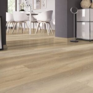 Soft Oak Natural flooring installed in a bright dining room with white chairs and a modern table