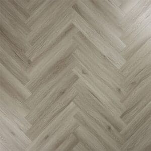 Abingdon Artisan Dryback Urban Grey luxury vinyl flooring laid in a herringbone pattern