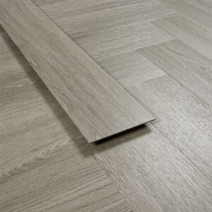 Single plank of Urban Grey luxury vinyl showing thickness and edge detail