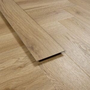 A single plank of Weathered Cedar LVT showing the slim profile and glue down backing.