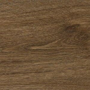 Close up detail of the textured surface and wood grain of Antique Walnut LVT