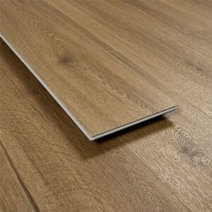 Angled view of a single Eminence Click Chestnut plank showing the click joining profile