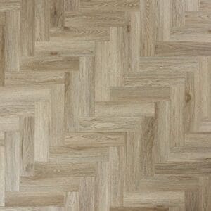 Top down view of Abingdon Tapestry Smoky Oak luxury vinyl flooring in a herringbone pattern