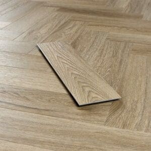 A single plank of Smoky Oak luxury vinyl showing wood grain detail against a laid floor