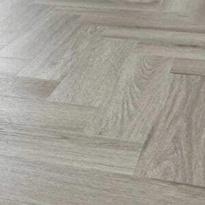 Angled view of Abingdon Tapestry Urban Grey flooring installed in a room