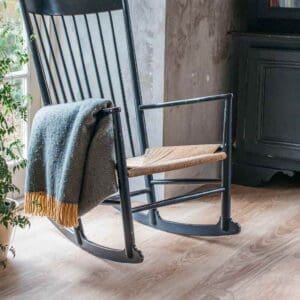 Blonde Oak flooring in a living room setting with a black rocking chair