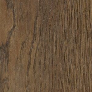 Harvey Maria Burnt Fig Herringbone flooring styled with a gold side table and green plant