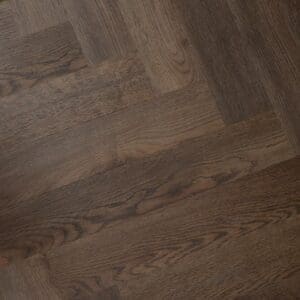 Close up of the wood grain texture on a Burnt Fig luxury vinyl tile