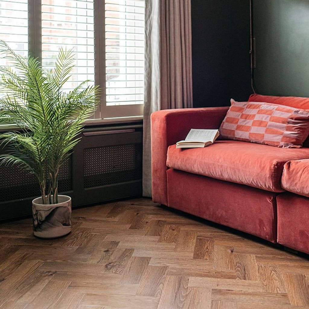 Overhead view of fumed oak wood effect parquet flooring pattern