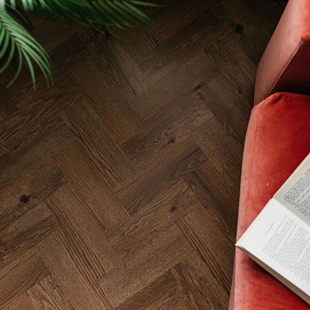 Close up of the wood grain texture on a Fumed English Oak LVT plank