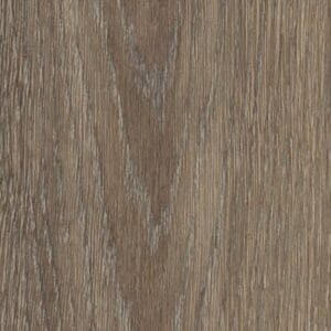 Close up of Garden Oak Chevron luxury vinyl tile showing wood grain texture