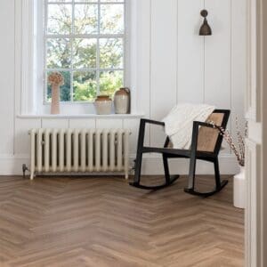 Wide shot of a bright room featuring Harvey Maria Brindle Herringbone flooring