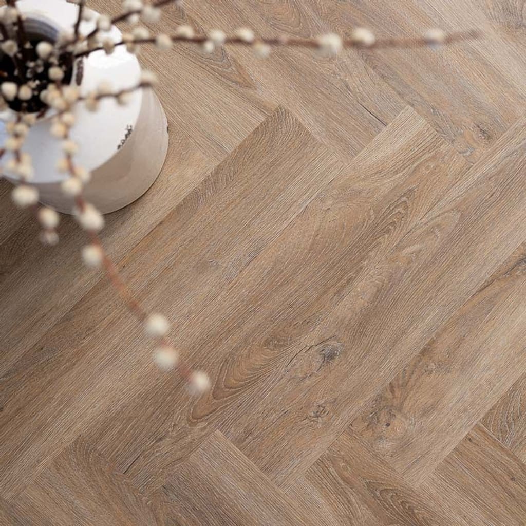 Harvey Maria Brindle Herringbone installed in a room with a black rocking chair