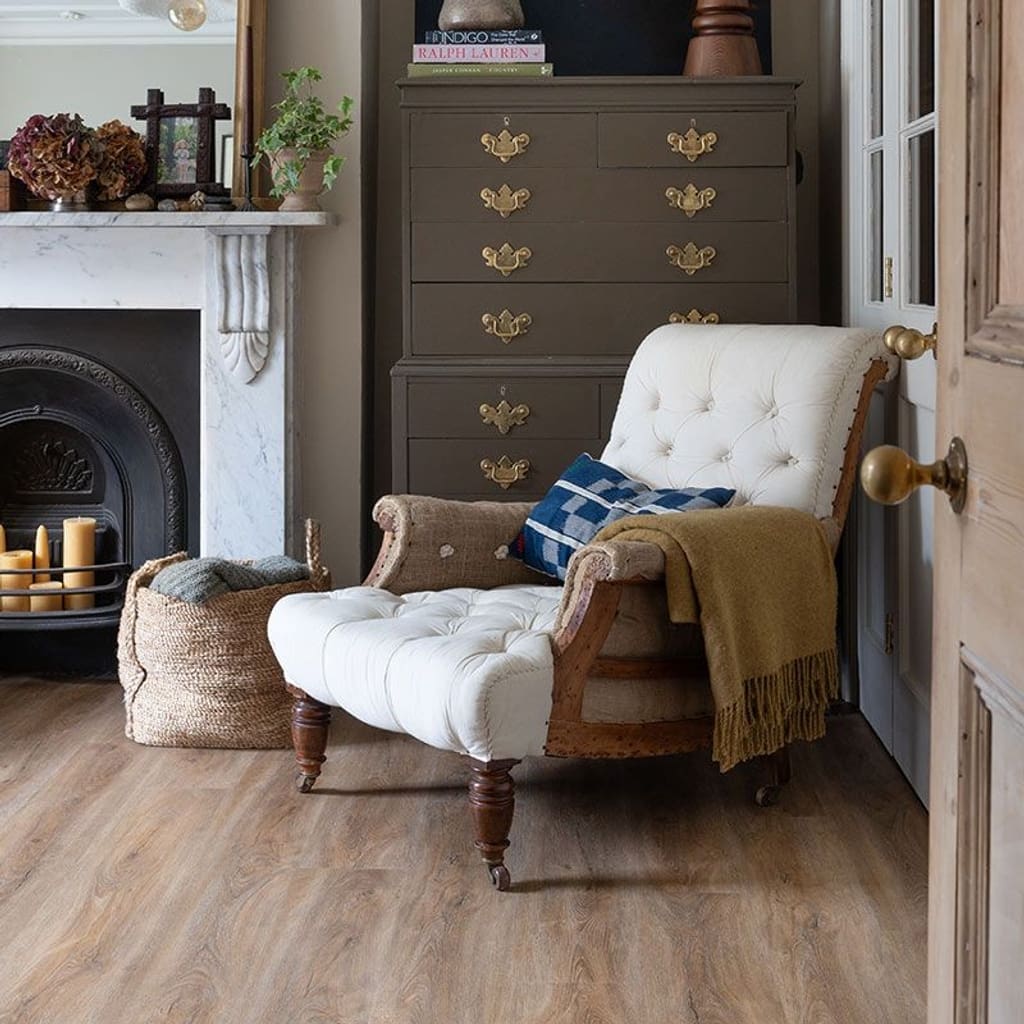 Harvey Maria Brindle Plank flooring in a traditional living room with fireplace and antique furniture