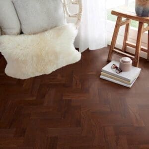 Burgundy Oak parquet flooring sample showing herringbone pattern orientation