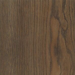 Harvey Maria Burnt Fig wood effect plank flooring with a decorative vase and dried flowers