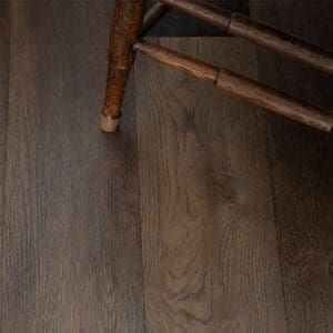 Harvey Maria Burnt Fig luxury vinyl plank showing vertical wood grain texture