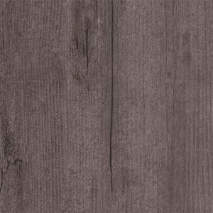 Close up of Harvey Maria Cinder Plank showing realistic wood grain and dark grey tones