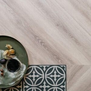 Overhead view of Earl Grey Chevron flooring showing the geometric pattern and wood grain detail
