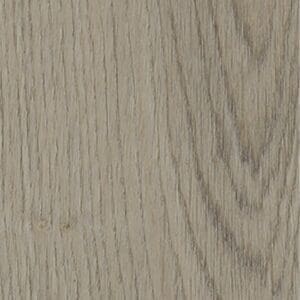 Harvey Maria Farro Herringbone flooring installed in a modern kitchen with wicker bar stools.