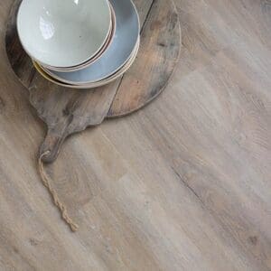 Harvey Maria Flaxen Oak flooring installed in a rustic kitchen with wooden furniture