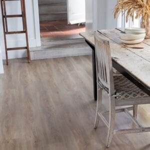 Flaxen Oak plank flooring paired with a geometric patterned tile rug