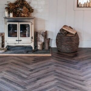 Detailed view of Garden Oak Herringbone pattern with natural wood grain texture