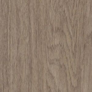 Close up of Harvey Maria French Oak luxury vinyl plank showing realistic wood grain texture