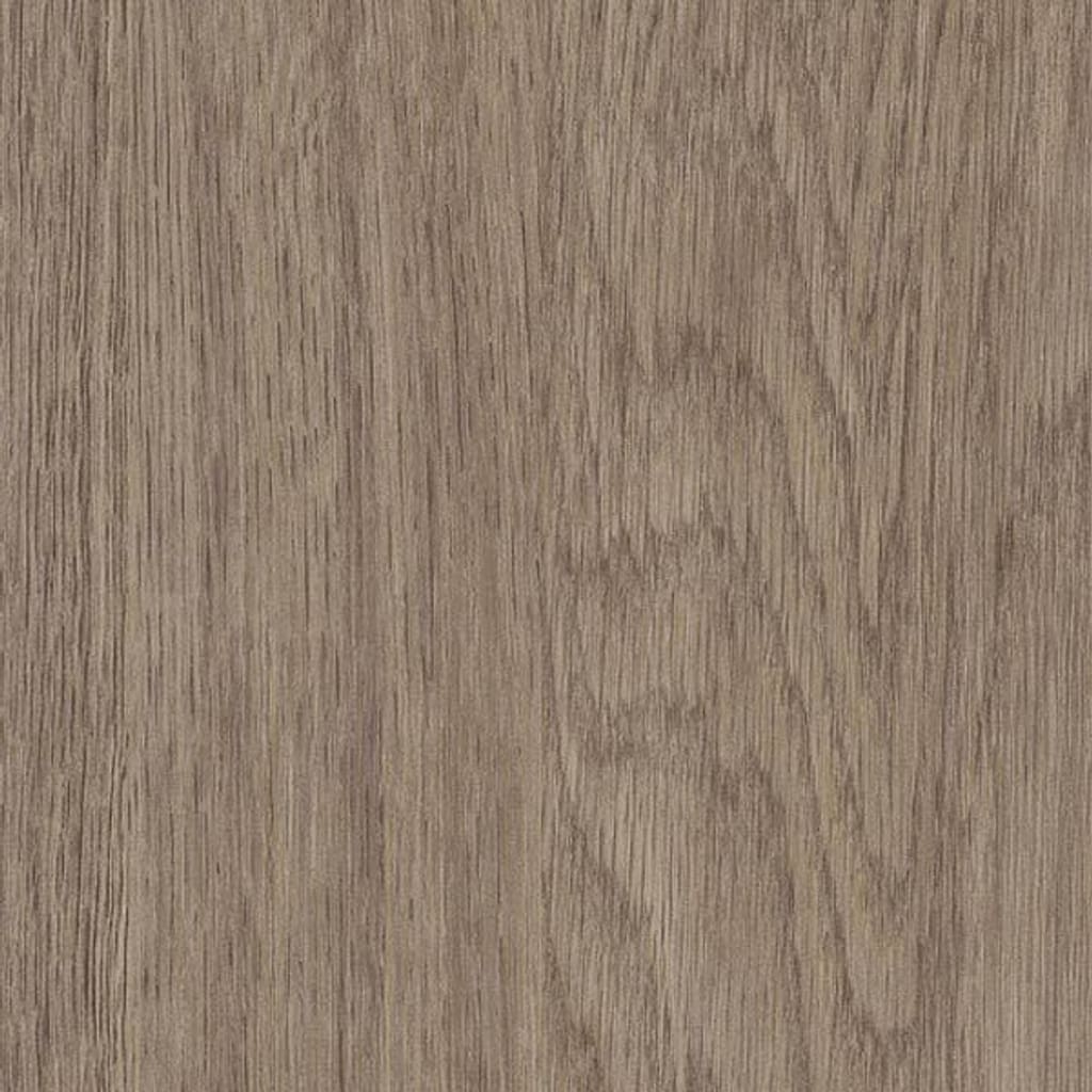 Close up of Harvey Maria French Oak luxury vinyl plank showing realistic wood grain texture