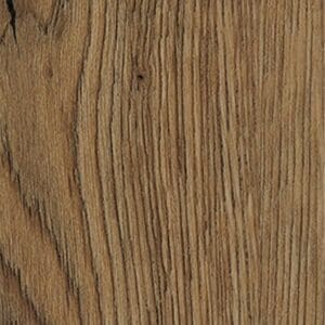 Harvey Maria Mulberry Herringbone flooring installed in a room with a wooden stool and book