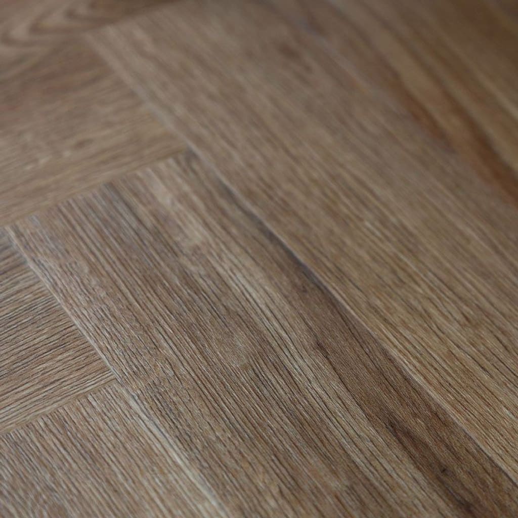 Direct overhead view of a single Mulberry Herringbone plank showing detailed oak grain