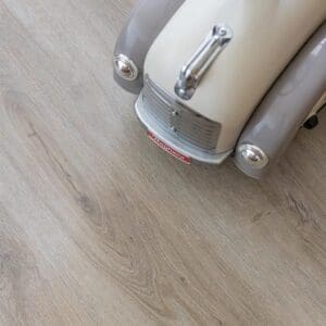 Detailed texture swatch of Harvey Maria Oast Plank showing natural oak knots and grain