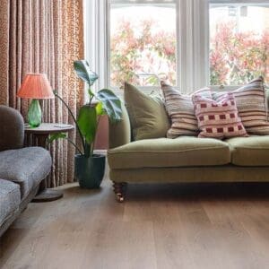 Pale Rattan wood effect planks installed in a rustic dining area with wooden furniture