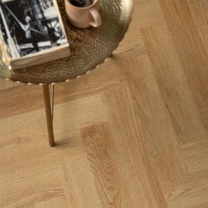 Close up of Harvey Maria Pippin Parquet showing the natural wood grain texture and golden tones