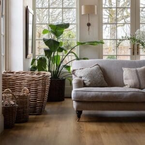 Close up of Harvey Maria Pippin Plank showing the realistic wood grain texture and golden pine tones