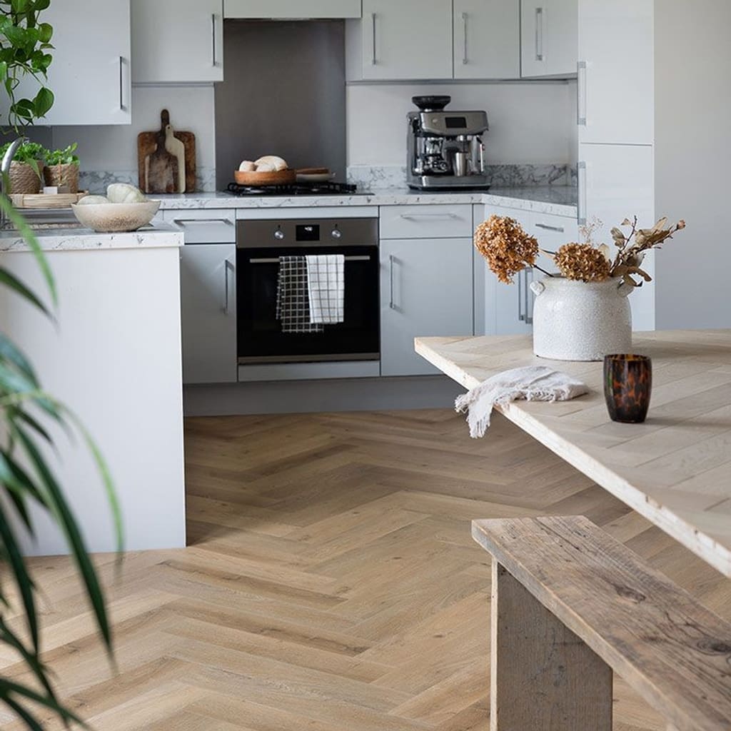 Alternate angle of Harvey Maria Rattan Herringbone flooring in a bright kitchen setting